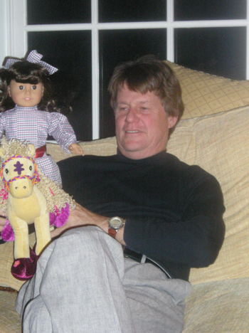 Tom with doll and toy pony